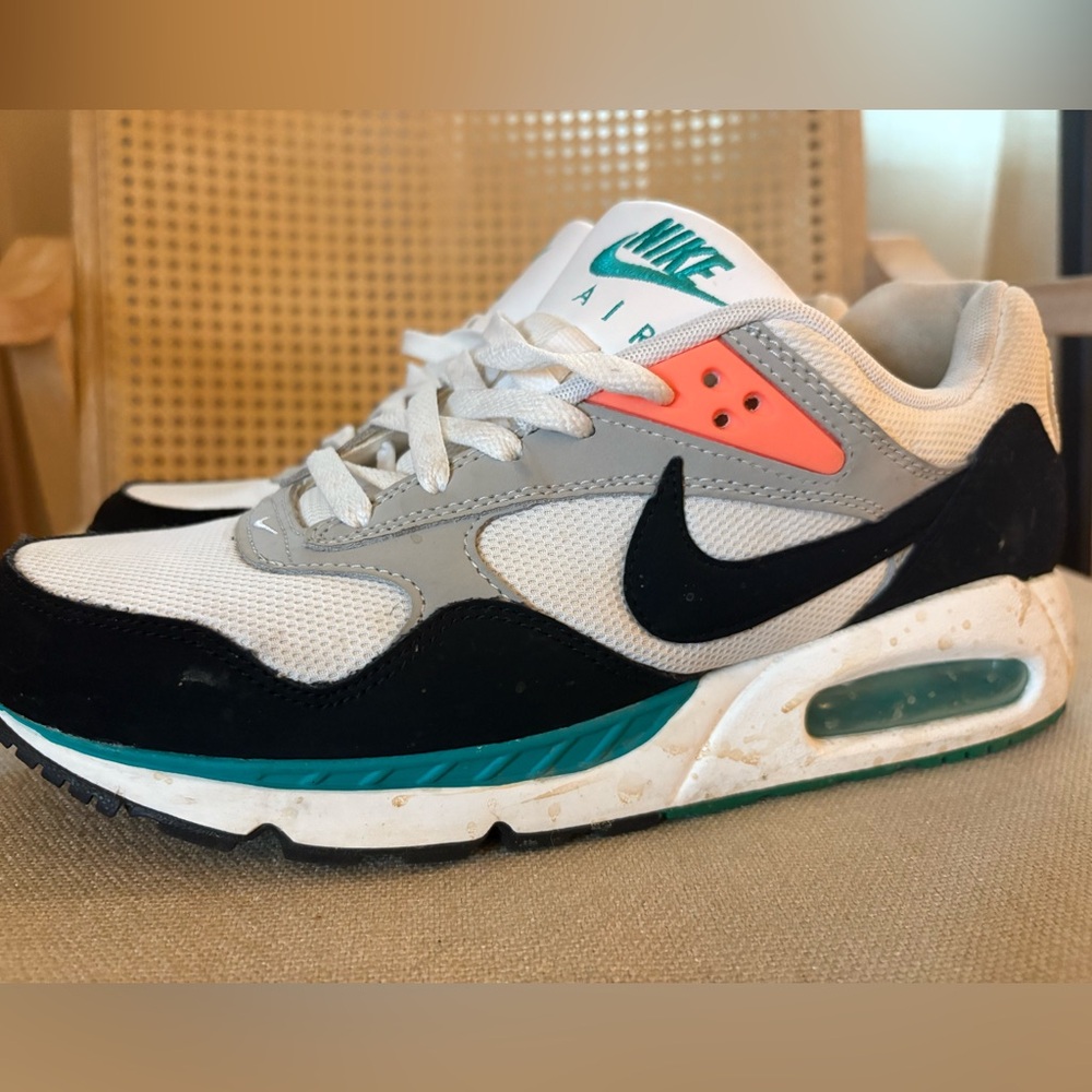 Nike Air Sneakers with Black, Gray, and Teal Highlights